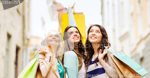 Image of girls with shopping bags in ctiy