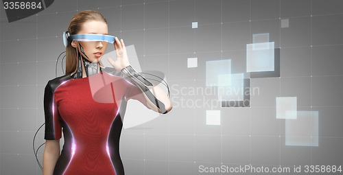 Image of woman with futuristic glasses and sensors