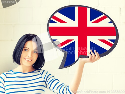 Image of smiling woman with text bubble of british flag