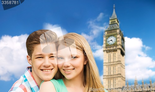 Image of happy couple over big ben tower in london