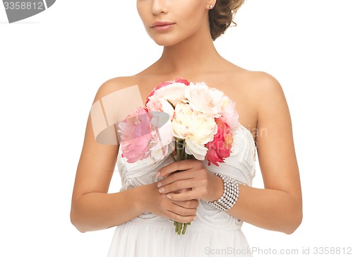 Image of woman with bouquet of flowers