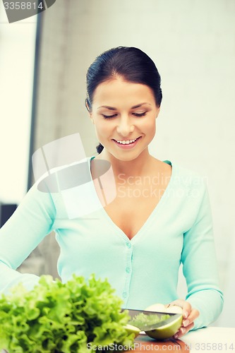 Image of beautiful woman in the kitchen