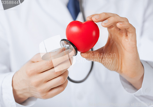 Image of man hands with heart