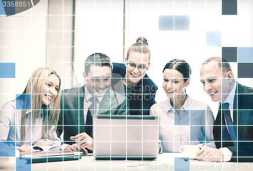 Image of business team with laptop having discussion