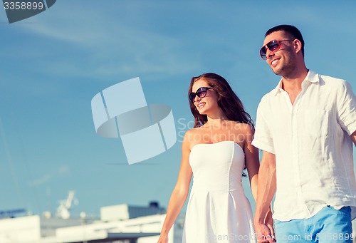 Image of smiling couple in city