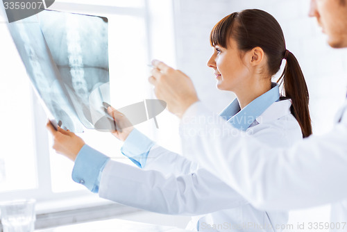 Image of doctor and nurse exploring x-ray