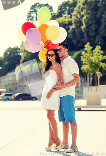 Image of smiling couple in city