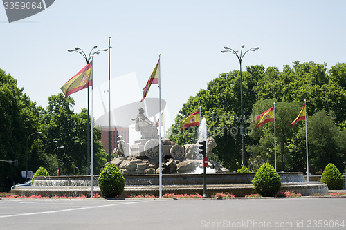 Image of Cybele fountain with Spanish flags