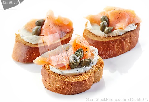 Image of toasted bread with smoked salmon fillet