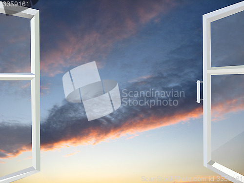 Image of window opened to the sunset