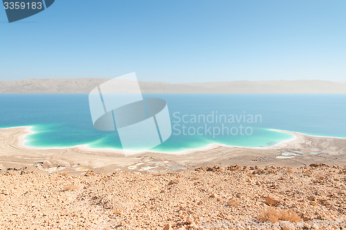 Image of Exotic landscape Dead Sea shoreline aerial view with mountains