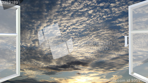 Image of window opened to the sunset