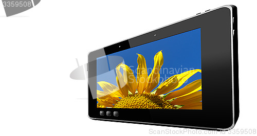 Image of black tablet with beautiful sunflower isolated