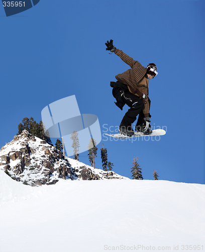 Image of Snowboarder jumping