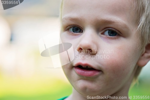 Image of Closeup portrait of happy kid face