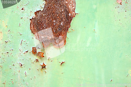 Image of grunge metal background with ripped hole