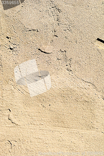 Image of broken wallpaper texture of old stone wall with a crack background
