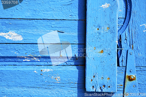 Image of rusty metal     nail dirty stripped paint in the  and morocco kn