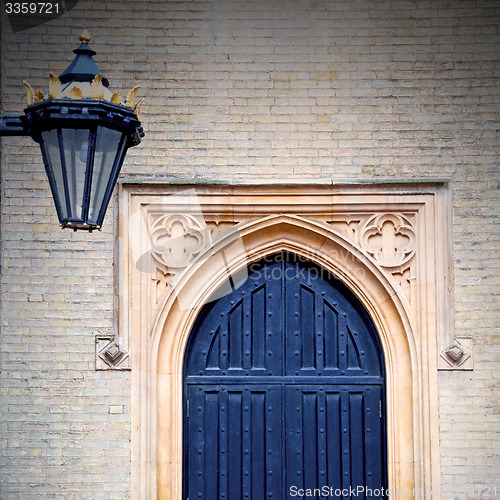 Image of brown wooden parliament in london old  door and marble antique  