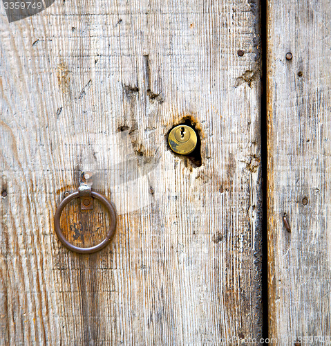 Image of rusty  brown    morocco in africa the old wood  facade home and 