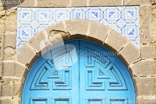 Image of antique door in morocco africa blue  