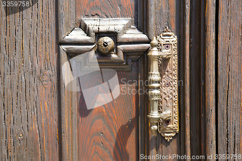 Image of abstract  house  door     in italy  lombardy     closed  nail ru