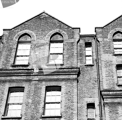 Image of old windon in england london brick and glass the wall 