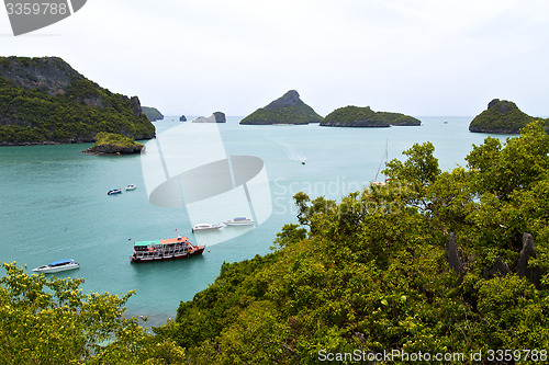 Image of  boat coastline of a  green lagoon and    bay  