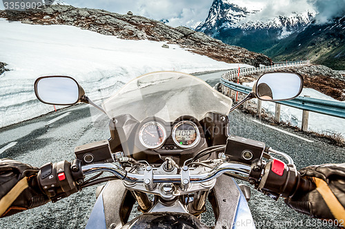 Image of Biker First-person view, mountain serpentine.