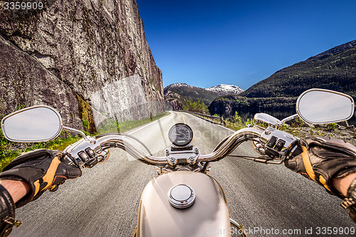 Image of Biker First-person view, mountain serpentine.