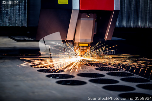 Image of CNC Laser cutting of metal, modern industrial technology.