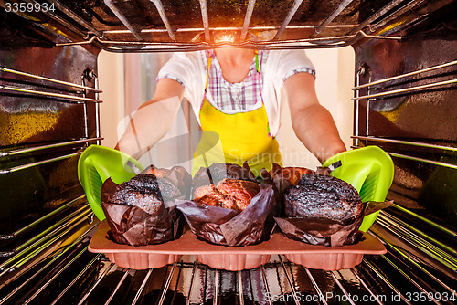 Image of Baking muffins in the oven