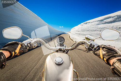 Image of Biker First-person view, mountain serpentine.