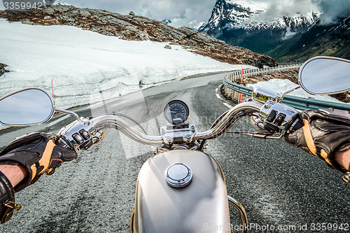 Image of Biker First-person view, mountain serpentine.