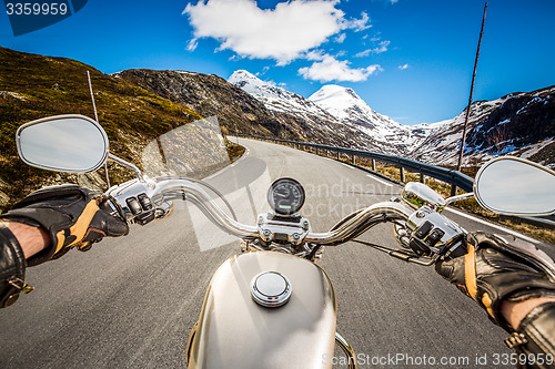 Image of Biker First-person view, mountain serpentine.