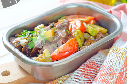 Image of baked meat with vegetables