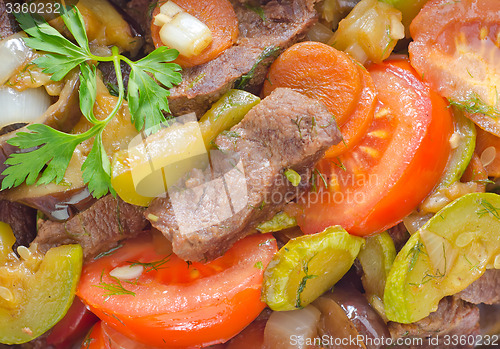 Image of baked meat with vegetables