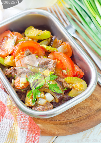 Image of baked meat with vegetables