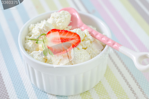 Image of cottage with strawberry