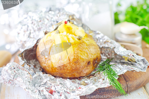 Image of baked potato in foil