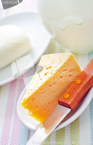 Image of fresh cheese on the white plate