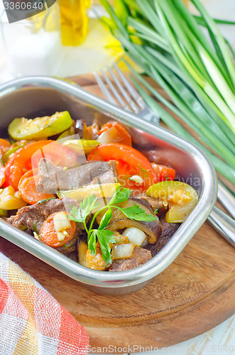 Image of baked meat with vegetables