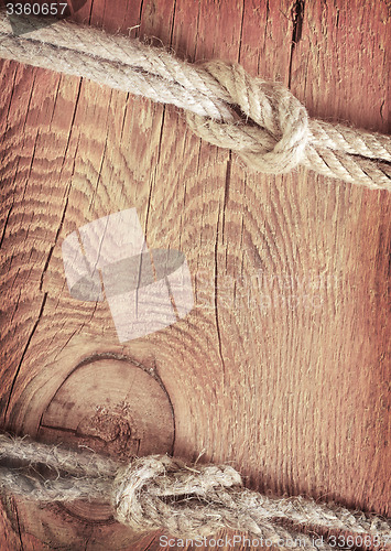 Image of rope on wooden background