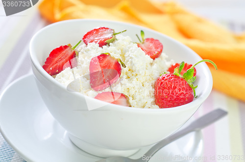 Image of cottage with strawberry