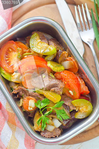 Image of baked meat with vegetables