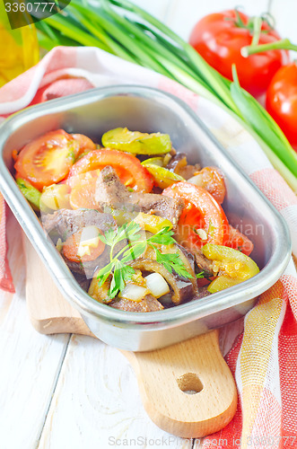 Image of baked meat with vegetables