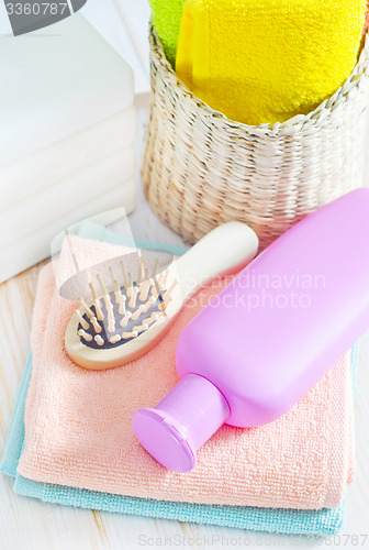 Image of color towels and shampoo