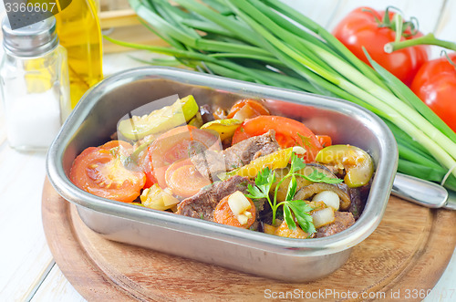Image of baked meat with vegetables
