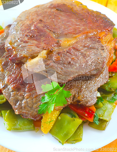 Image of baked meat with vegetables