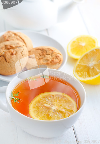 Image of Fresh tea with lemon in the white cup